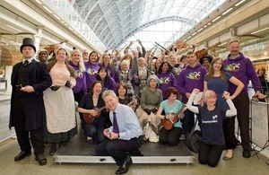 Don Foster with performers at St Pancras Station