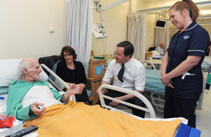 The Prime Minister meets patients in a hospital.