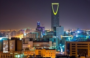 Elevated view of the Riyadh skyline illuminated at night in Saudi Arabia