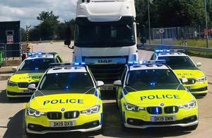 4 Police patrol cars and a National Highways’ HGV cab