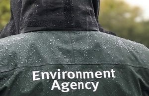Images shows the Environment Agency logo on a green jacket