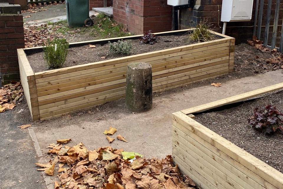 The planters which have transformed the piece of land and deterred fly-tippers