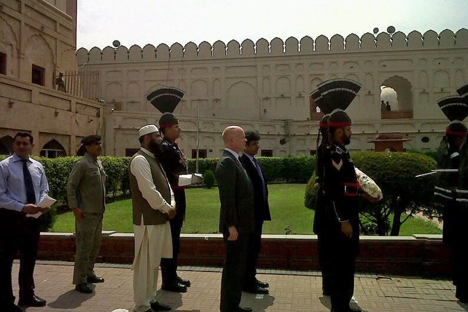 William Hague about to lay a wreath at the tomb of the poet Iqbal in Lahore.