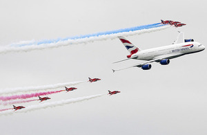 Red Arrows Hawk jets in formation with a British Airways Airbus A380 at the Royal International Air Tattoo [Picture: Senior Aircraftman Lee Matthews, Crown copyright]