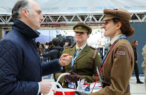 Minister for Defence People and Veterans, Leo Docherty meets serving personnel and veterans selling poppies on behalf of the Royal British Legion at Waterloo Station