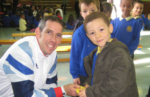 Etienne Stott with young sports players