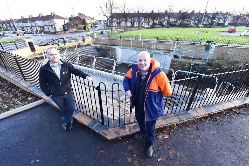 The image shows Environment Agency Project Manager Stephen Frost on the left and Councillor Barrie Cooper from Middlesbrough Council on the right. 