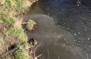 The image shows raw sewage entering the River Gaunless
