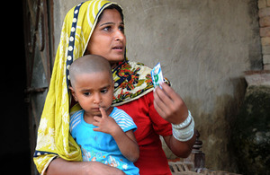 Sakina receives a monthly cash grant on her debit card provided under Pakistan’s national Income Support Programme (BISP) which makes it possible her to buy food for her family.