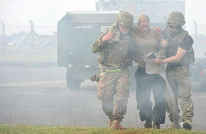 Members of Number II (Army Cooperation) Squadron evacuate a 'casualty'