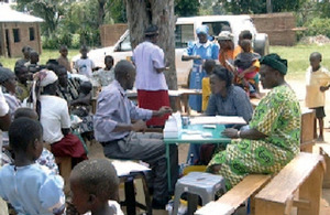 Kakamega highlands, Kenya: health officials test for malaria.