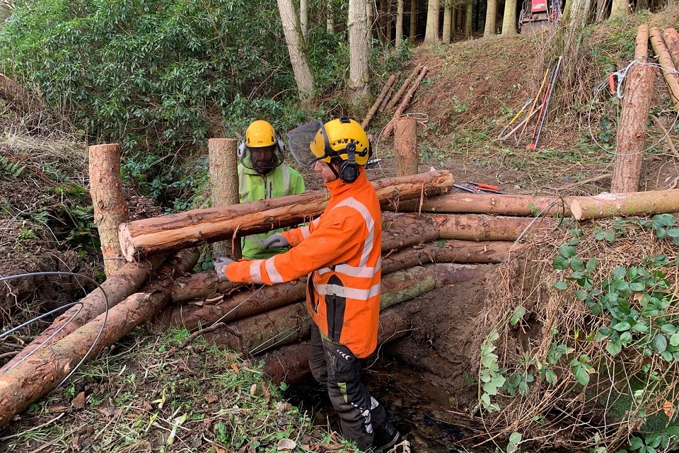 The image shows one of the 'winged' leaky dams under construction on the Birkey Burn 