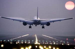 Passenger aeroplane landing at airport.