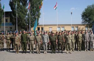 Representatives of all the National Contingents assemble with the First Deputy Minister, Colonel General Zhasuzakov after the Opening Ceremony