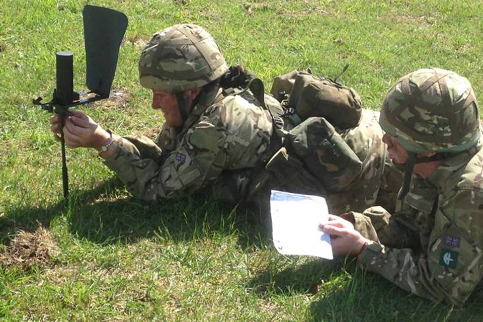 Sergeant Lisa Wright and Corporal Steven Hoskins prepare for the Trip Flare lesson