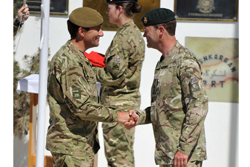 Brigadier Doug Chalmers, Commander of 12 Mechanized Brigade (left), takes over command of Task Force Helmand from Brigadier Patrick Sanders, Commander of 20th Armoured Brigade