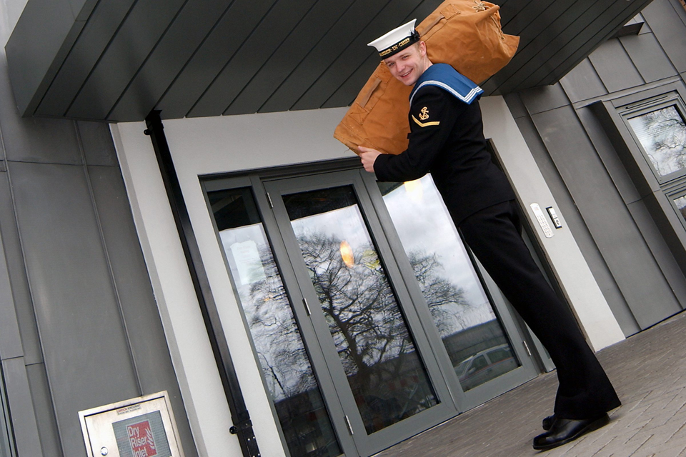 A sailor moves into a newly-built accommodation block at HM Naval Base Clyde