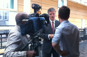 Michael Moore being interviewed by STV in Dundee.