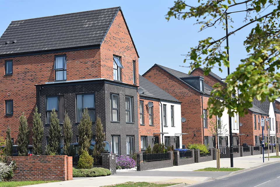 Row of modern new build houses in a street setting