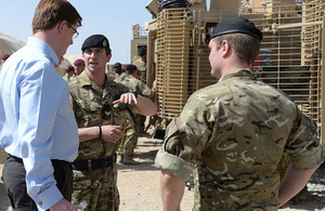 Chief Secretary to the Treasury Danny Alexander talking to two soldiers in Afghanistan