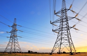 Electricity pylon in a field