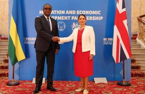 Image of Home Secretary with Rwandan minister.