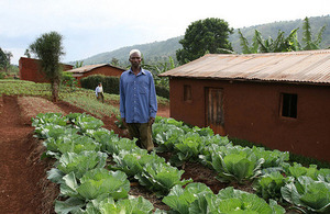 Ramadhan stands among his cabbages at his home in Rugina, Rwanda. Picture: Tiggy Ridley/DFID