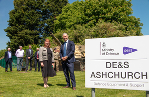 Belinda Lunn, Senior Responsible Owner for the Vehicle Storage Support Programme and Steven Holbrook, Managing Director of Skanska, are pictured next to a sign which reads DE&S Ashchurch.
