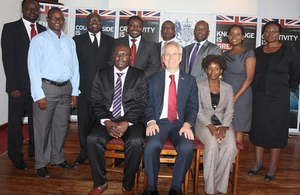 Photo of British High Commissioner James Thornton with Chevening scholars