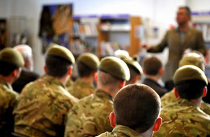 Bestselling author Andy McNab addressing young soldiers on the benefits of education in the Catterick Garrison library