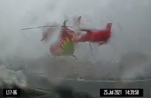 G-LNDN on the helipad at Royal London Hospital during heavy rainfall