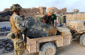 Soldiers dismantling an electrical installation at Forward Operating Base Shawqat [Picture: Corporal Si Longworth RLC, Crown copyright]