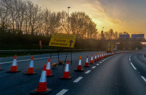 image showing cones on motorway that have closed off an exit.