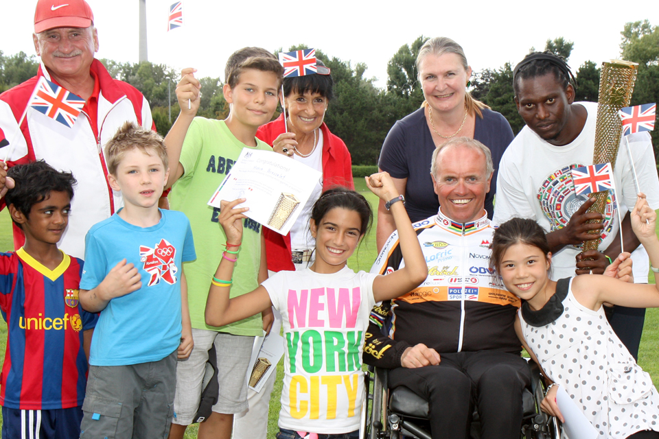 HMA Susan le Jeune d'Allegeershecque and the Austrian paralympic medal winner, Wolfgang Schattauer, at the VIC Summer Camp sports day