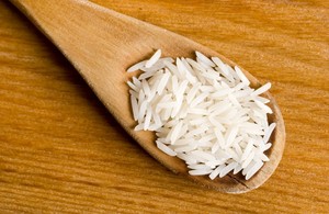 Rice in wooden spoon