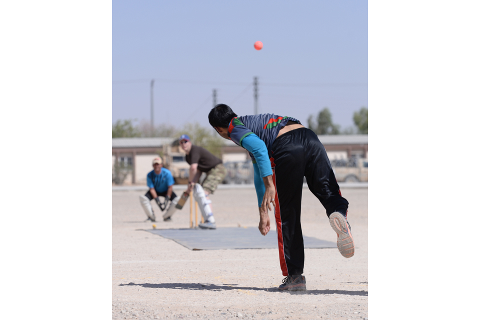 Afghan warrior bowls a cricket ball