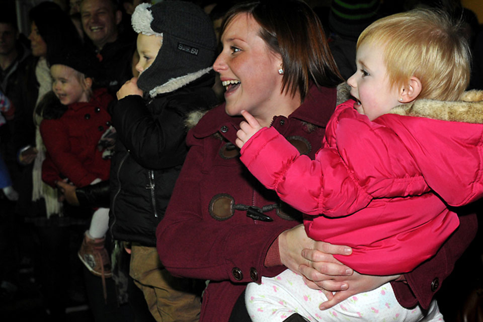 Overjoyed families and loved ones greet the soldiers of the Light Dragoons at Robertson Barracks in Norfolk