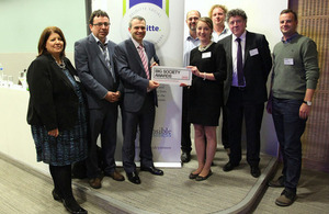 Deloitte representatives accepting a Big Society Award