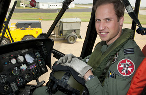 Flight Lieutenant William Wales in the cockpit of a Royal Air Force Sea King helicopter