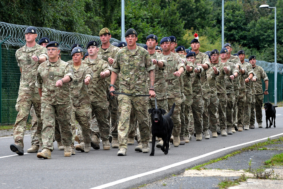 Soldiers and dogs of 104 Military Working Dog Unit arrive back at North Luffenham