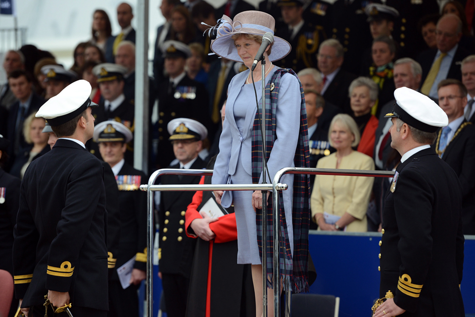 Lady Marie Ibbotson takes the salute