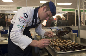 Senior Aircraftman Duncan Perry preparing dessert in the Parade Du Chef competition on RAF Day [Picture: Andrew Linnett, Crown copyright]