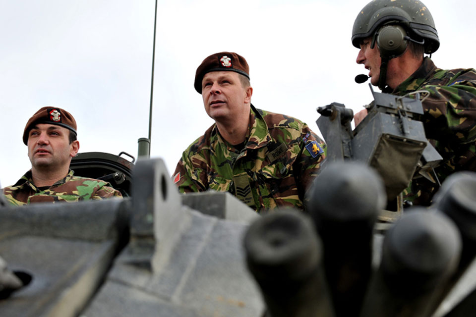 Territorial Army soldiers of the Royal Wessex Yeomanry take aim with a Challenger 2 main battle tank 