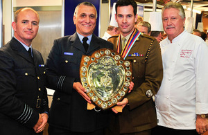 The Army and Royal Air Force jointly win Exercise Joint Caterer 2012. From left: Group Captain Killey, team leader for Defence Fuels and Food Services; Squadron Leader John Healey, representing the Royal Air Force Catering Team; Warrant Officer Class 2 Na