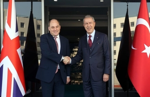 Defence Secretary, Ben Wallace shaking hands with Turkish Defence Minister, Hulusi Akar.