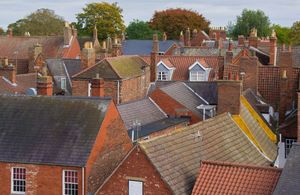Image shows rooftops of houses.