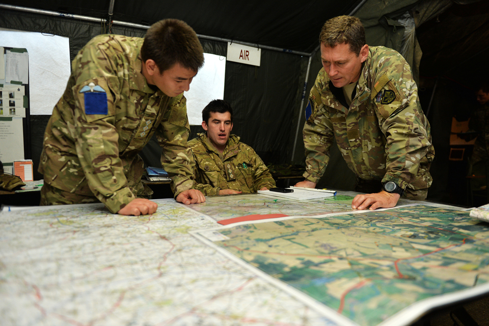 Battle group commanders pore over a map