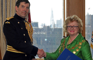 The Deputy Commander of the Army's London District, Brigadier Matthew Lowe, and the Lord Mayor of Westminster, Councillor Angela Harvey, at the Armed Forces Community Covenant signing in City Hall