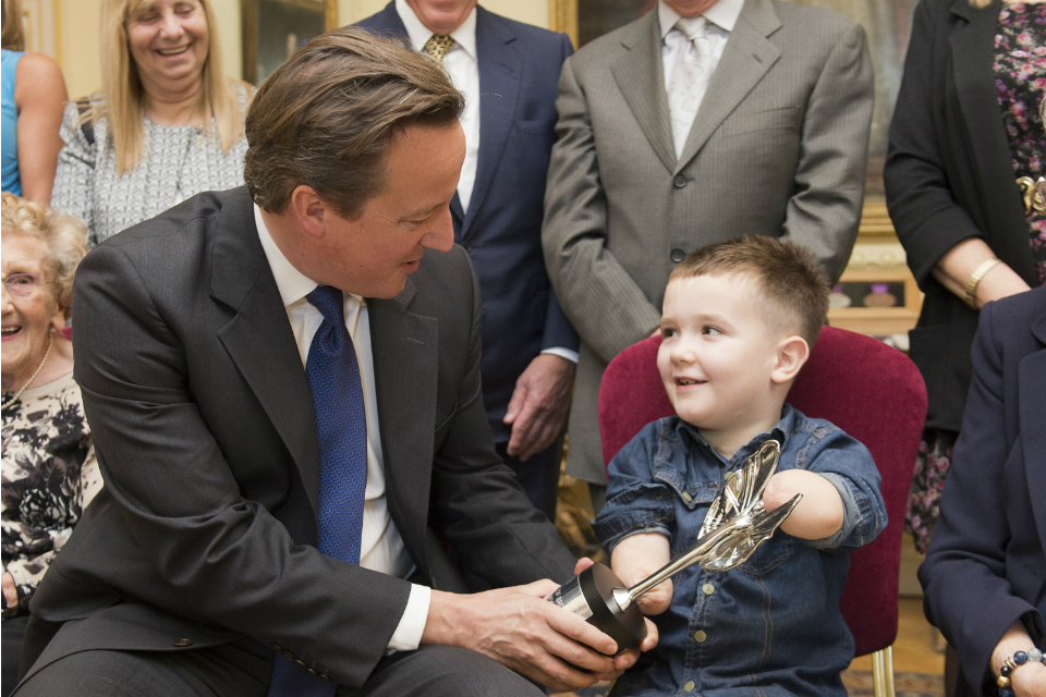 David Cameron with Pride of Britain Award winners 2013