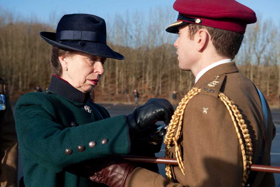 The Princess Royal presents a soldier with a medal